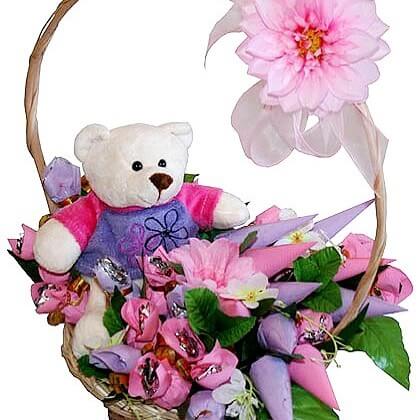 gift basket with artificial flower and teddy bear toy